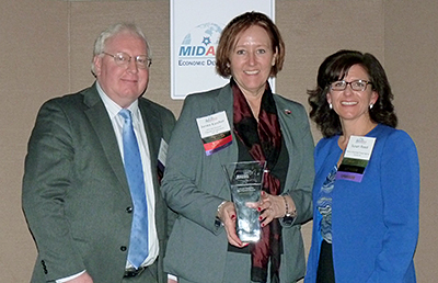 Flint & Genesee Chamber of Commerce’s 2014 Annual Report won first-place at the Mid-America Competitiveness Conference & Site Selector Forum