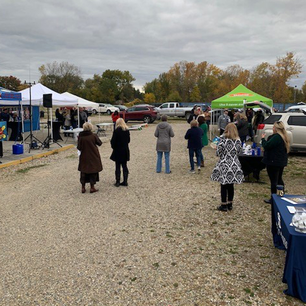 Members attend After Hours Wine Down's Fall Tailgate Night