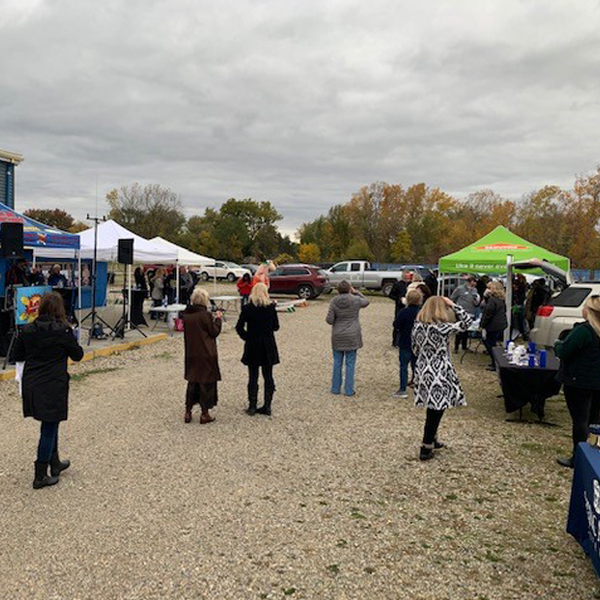 Members attend After Hours Wine Down's Fall Tailgate Night